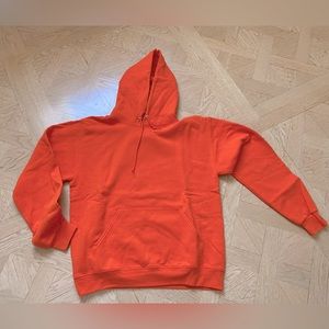 Soft orange hoodie sweatshirt size large.